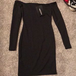 Little black dress from pretty little thing.